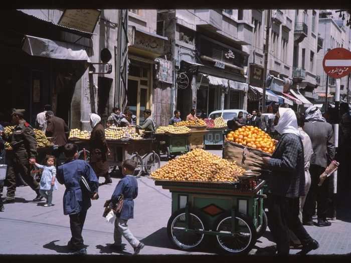 The photos show bustling street shopping scenes as well.