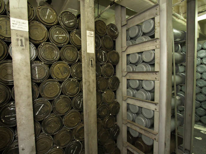 In one room are the rounds, still in canisters, that get delivered from the dock via an elevator at the far end of the room.