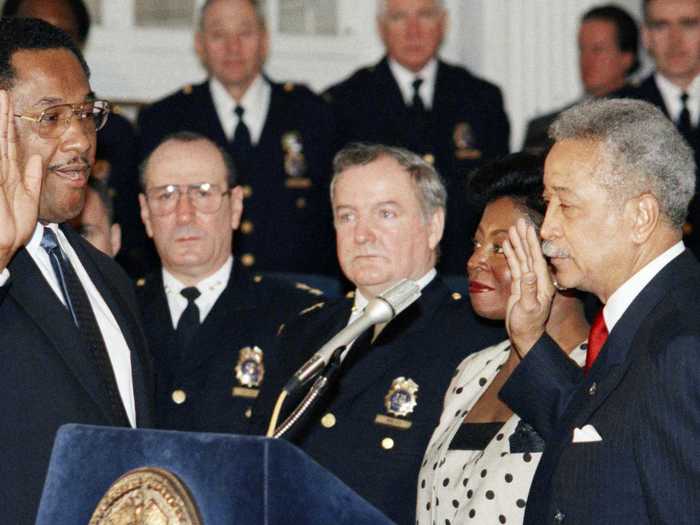 Dinkins also hired a police commissioner with a fresh outlook on stopping crime. Lee Brown (left), sworn-in as the city