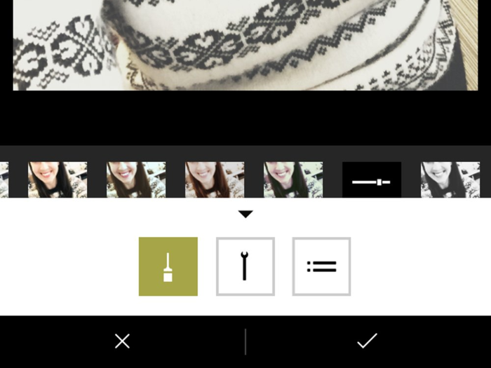 The paint brush icon lets you choose filters. The screwdriver icon lets you access additional editing tools. The box with two bars lets you selectively remove edits.