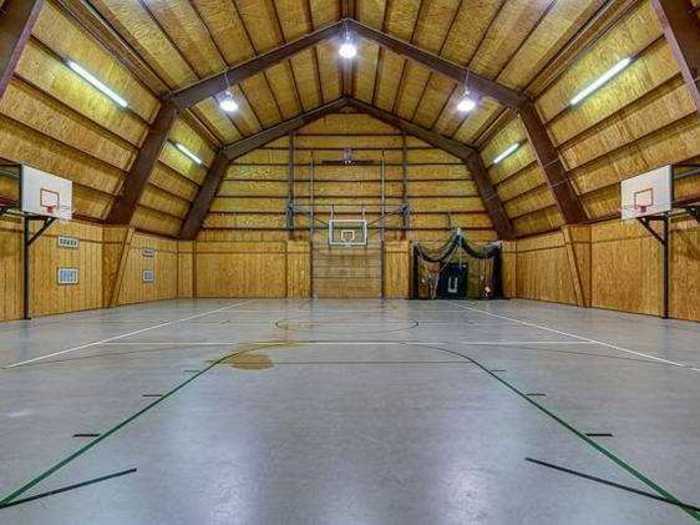 This barn in Texas has a fully equipped gymnasium with a regulation half-court.