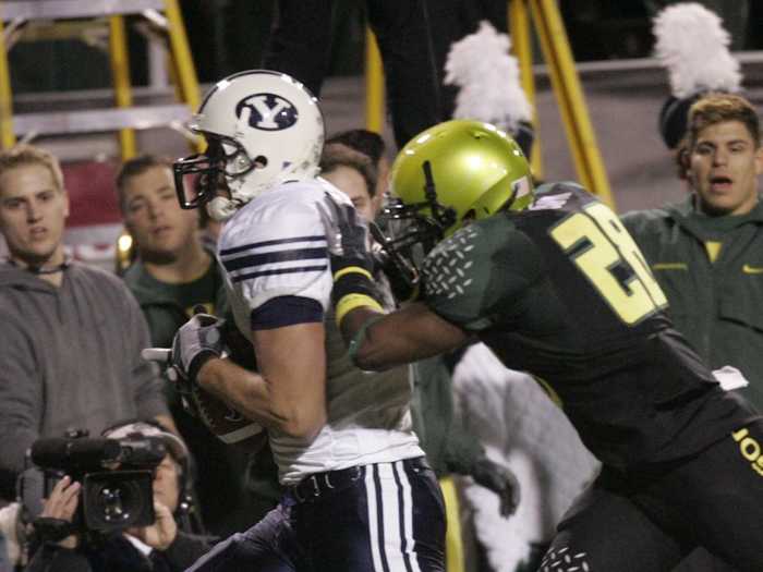 The uniforms really changed at the 2006 Las Vegas Bowl when Oregon unveiled gold helmets with a faint flame patten (difficult to see in the photo below).