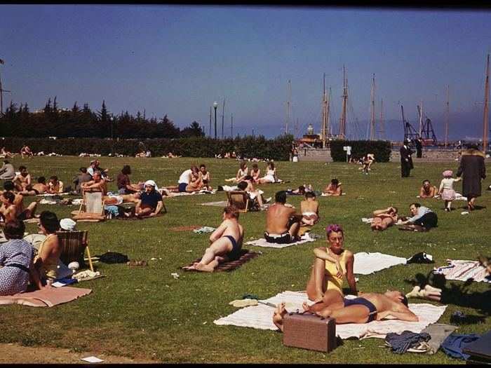 Tourists and locals sun themselves at the Marina Green in 1940.