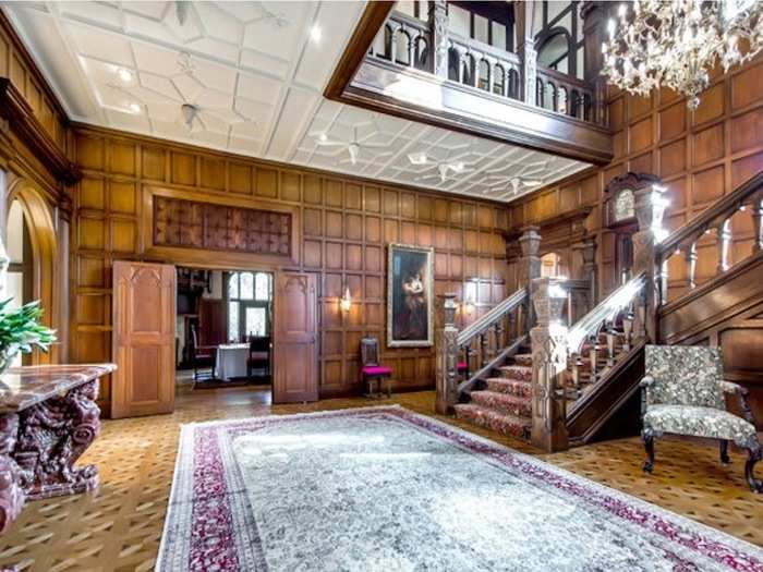 The inside decor is dramatic, with high ceilings, custom millwork, and decadent chandeliers.