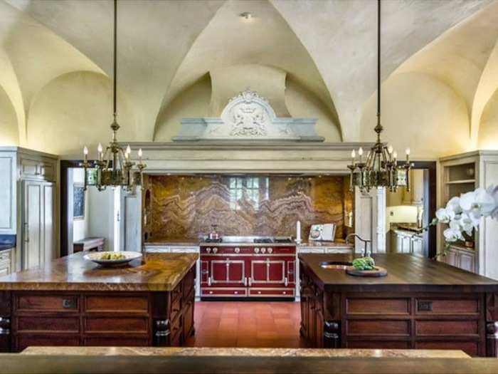 This huge kitchen has enough room for two separate islands.