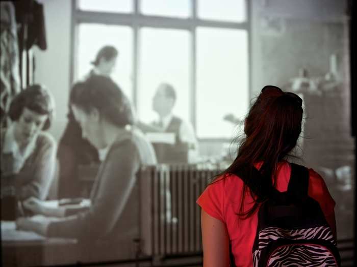 A section of historic photographs shows Bletchley Park from when it was used by the Secret Service.