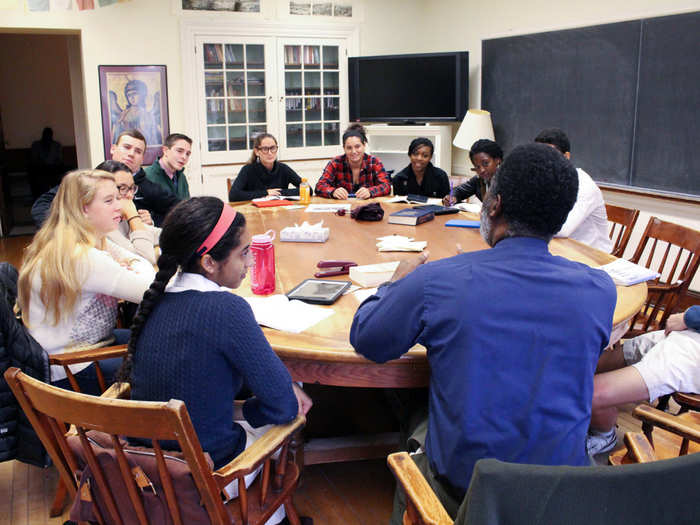 In a 300-level social ethics course, religion teacher Russell Weatherspoon took a seat at the round table and said, "Where do you want to start?" Within minutes, students were batting around text citations, asking open-ended questions, and leading the discussion without interference. No one raised hands.