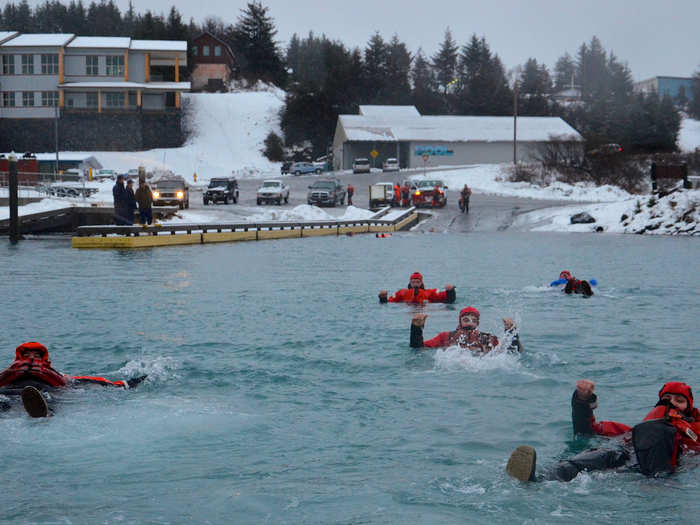 Crew members of Coast Guard ships also conduct a 100-yard survival swims in 39-degree water.