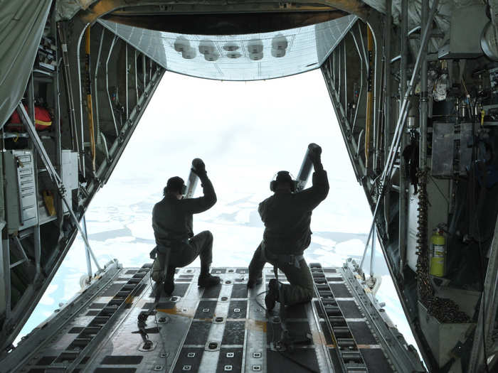 The Coast Guard also helps to conduct scientific experiments over the Arctic. In this photo, crew members deploy probes that measure sea temperature, salinity, and density in order to gain a better understanding of the Arctic during the summer season.