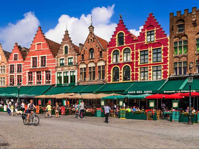 Imbibe and people-watch at one of the street cafes in picturesque Bruges, Belgium.