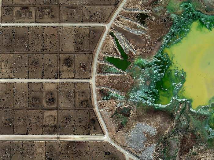 British artist Mishka Henner captured the effects of industrial farming on the American countryside. Here you can see the chemical byproducts from the feedlots at an industrial farm. He exhibited these photos in September.