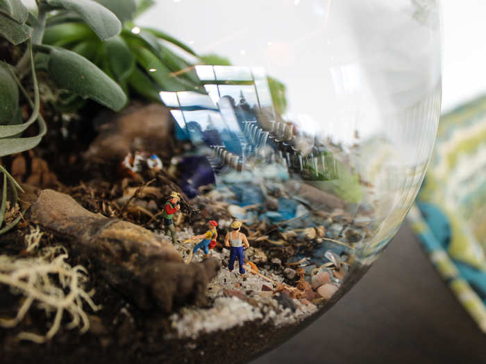 Employees can spend hours gazing at the tiny figurines in these bowls alongside booths in the dining hall.