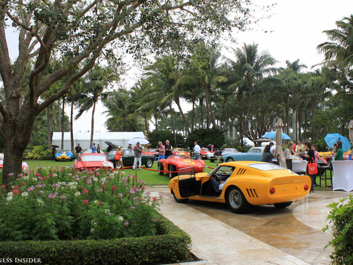 We spotted multimillionaire Ferrari collector Preston Henn presenting his 1965 Ferrari 275 GTB Competizione Speciale to the judges. The bright yellow car is worth a reported $75 million.