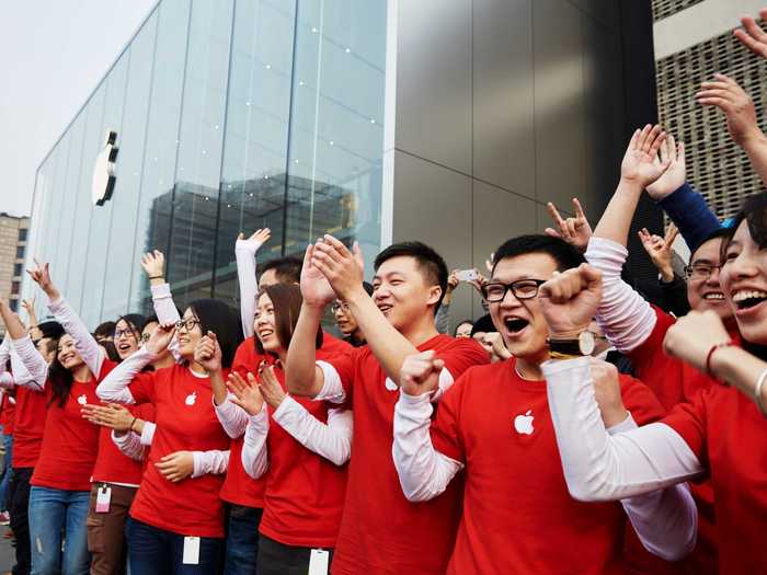 An army of red-shirt-clad employees were ready to help customers.