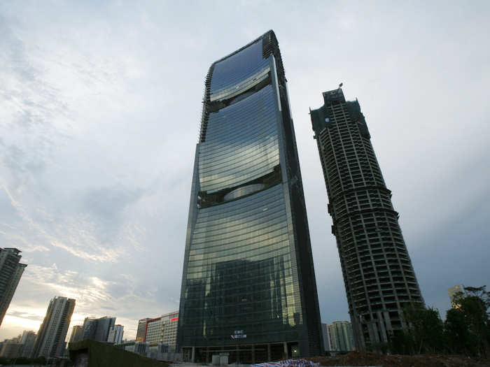 Pearl River Tower, Guangzhou, China. Built with an environmentally friendly concept, the 309 metre-tall skyscraper includes wind turbines and solar panels.