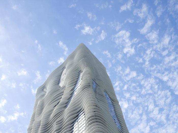 Aqua Tower, Chicago, USA. The name Aqua is a reference to the wave-like design of the balconies of the tower, and perfectly fits the setting of the Lake Michigan shores.