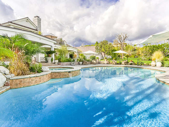 Outside, the home has a swimming pool and spa.