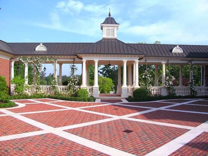 The property around the house looks more like a wedding venue than a private residence. This grand patio is perfect for entertaining.