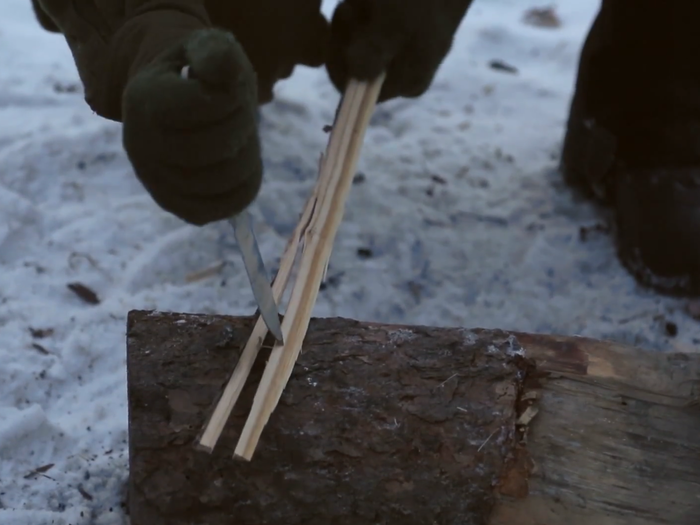 In Cool School, students are taught the ideal way to split wood into longer thin splints that will burn more easily and evenly.