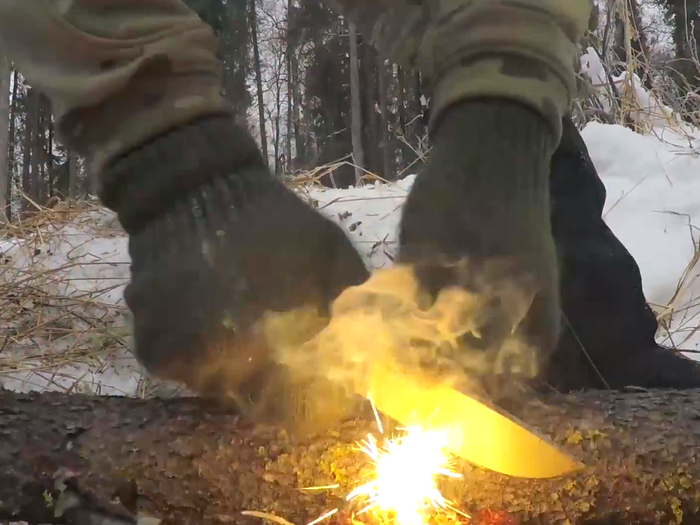 Servicemembers learn to create sparks with a metal match. Though somewhat antiquated, metal matches can be used indefinitely.