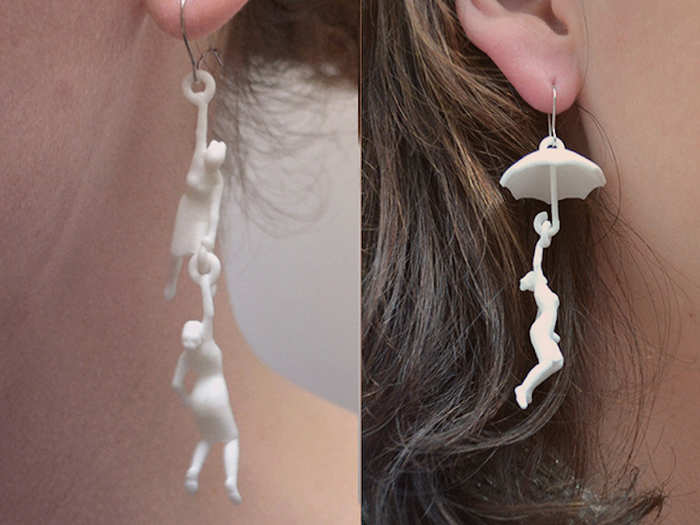 These $24 whimsical earrings feature four figures and two umbrellas