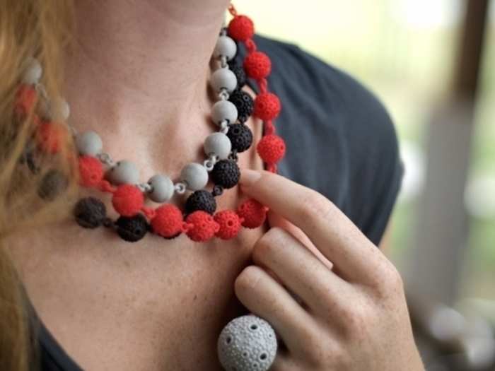 These textured ball necklaces add a pop of color to any collar line for $77 each