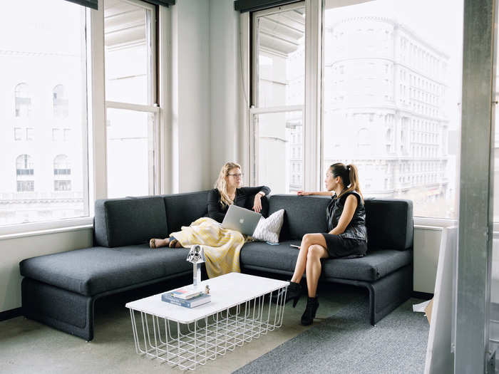 VP of people operations Florence Thinh and business operations manager Megan Tedford sit in a particularly sun-filled corner of the office.