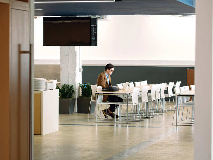 Outside of lunchtime, the all-hands area is a place for employees to hold meetings and get some work. Editor Chris Hutchinson finds a quiet moment here.