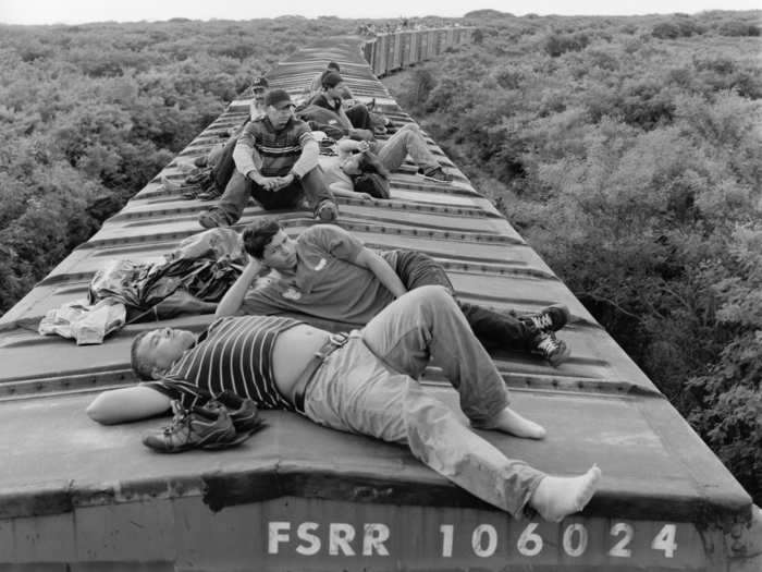 The trains are referred to as La Bestia (The Beast) and El Tren de la Muerte (The Train of Death) by the migrants because they are so dangerous to ride. Here, migrants ride the train through Oaxaca.