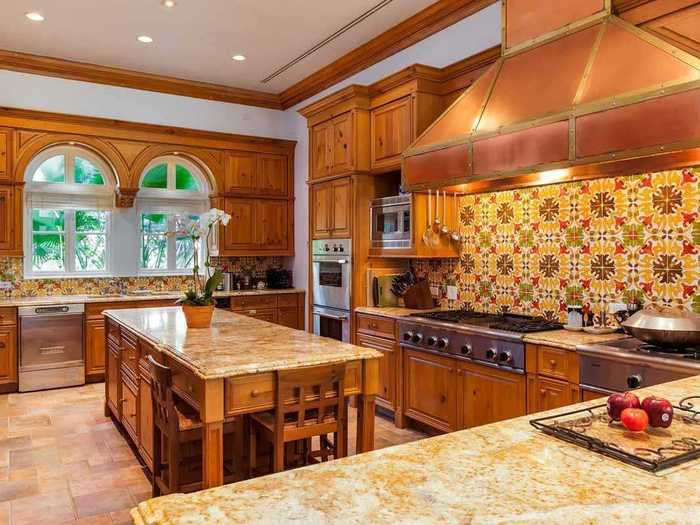 And the custom detailing never stops! Custom cabinetry lines the kitchen spacious kitchen.