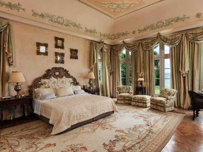 The huge master bedroom has oceanfront views. Five other bedrooms fill the mansion