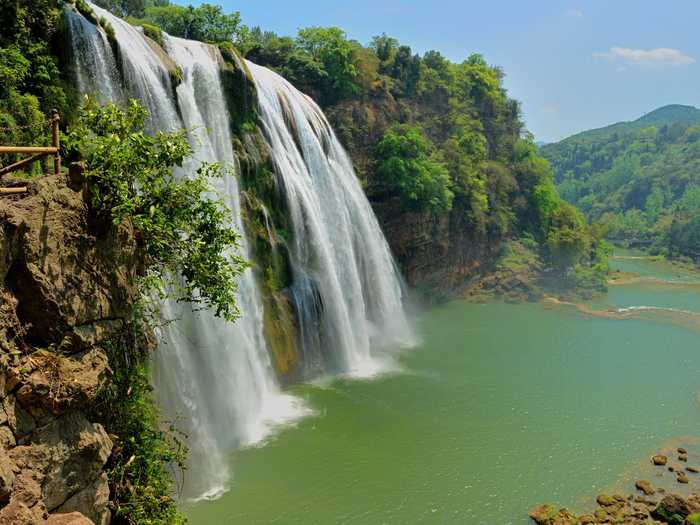 Look out over the Huangguoshu Waterfall, the tallest waterfall in Asia.