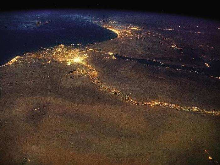 Here, you see the two cities of Cairo on the left and Jerusalem toward the right at night. Hadfield describes the cities along the Nile as a "4,258-mile braid of human life." We leave you with this profound Hadfield quote in the book