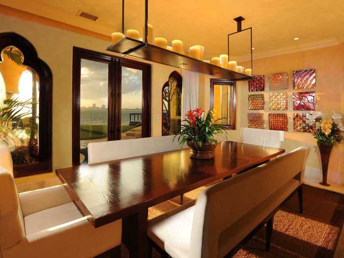 The dining room has space for more formal gatherings, as well as a great view to the outdoors.