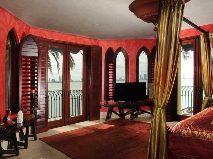 There are five bedrooms in total. This one has its own balcony and views of the Miami skyline.