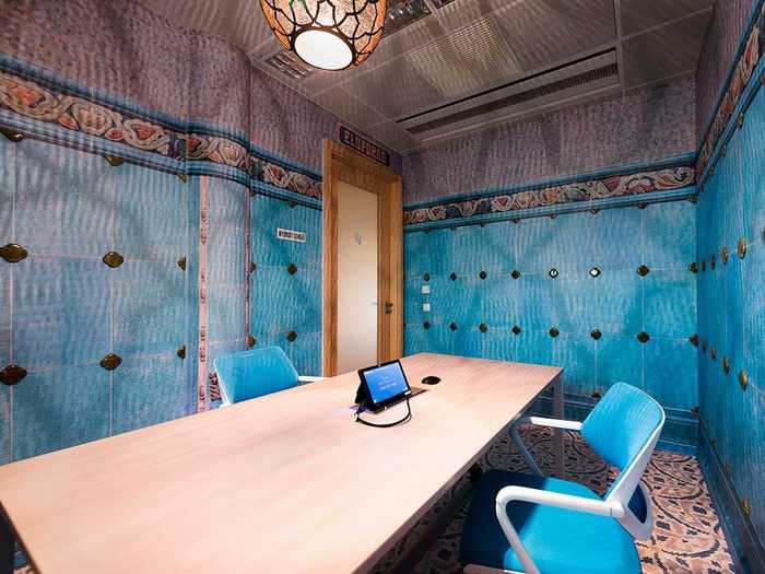 The walls in this room look like the tiles you might find in a spa.