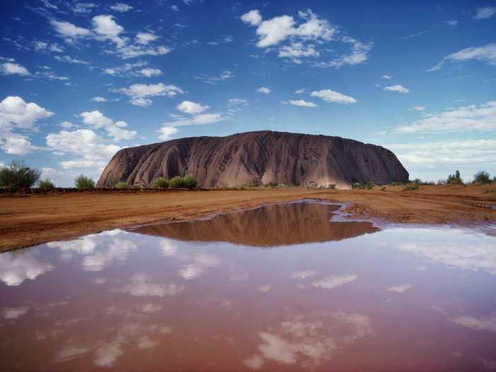 "I wanted to shed burdens," Davidson writes in "Inside Tracks." "To pare away what was unnecessary. The process was literal, in the sense of constantly leaving behind anything extraneous to my needs, and metaphorical, or perhaps metaphysical, in the sense of ridding myself of mental baggage." Pictured below is Uluru, the world