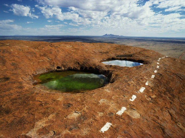 An ancient species of shrimp live in the pools atop Uluru, the water collected from rare rainstorms. "The indecipherable power of that rock had my heart racing. I had not expected anything quite so weirdly, primevally beautiful," Davidson writes.