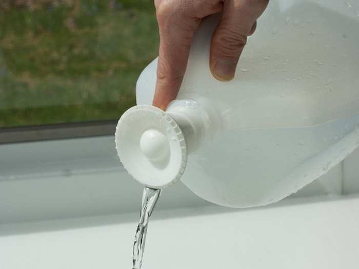 Turn your old milk jug into a watering can with a 3-D printed spout.