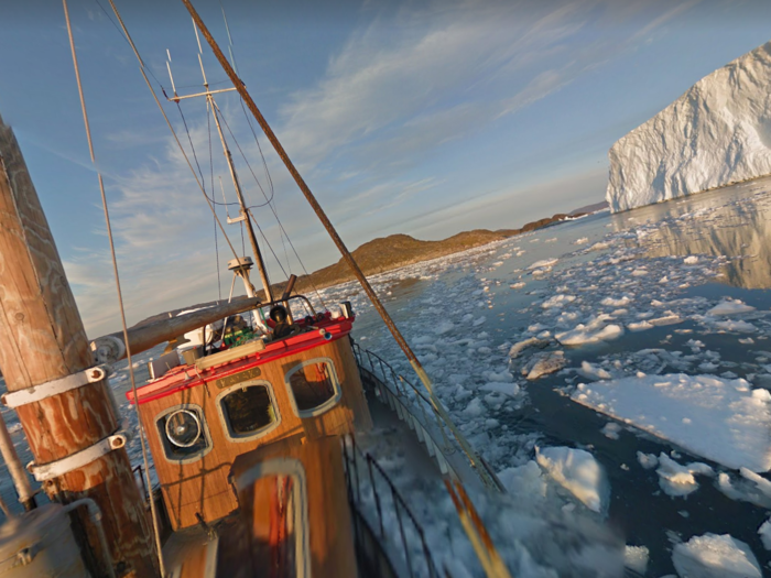 One of the best ways to explore Greenland is by boat, cruising among its fjords. Google did the same when shooting its pictures.