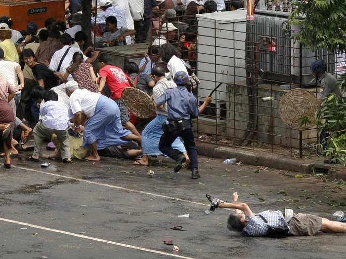 AFP photojournalist Kenji Nagai lies dying after police and military officials fired on him in Yangon, Myanmar on September 27, 2007.