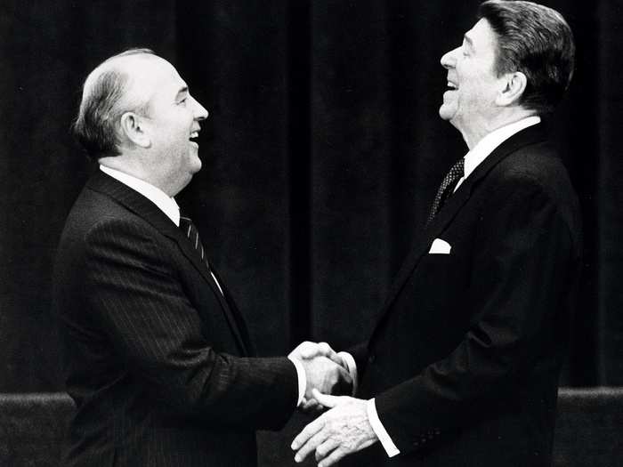 U.S. President Ronald Reagan (R) shakes hands at his first meeting with Soviet leader Mikhail Gorbachev to sign an arms treaty in Geneva, November 19, 1985. The two leaders met for the first time to hold talks on international diplomatic relations and the arms race.