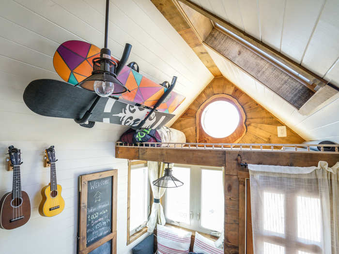 Snowboards hang in the mezzanine, although they