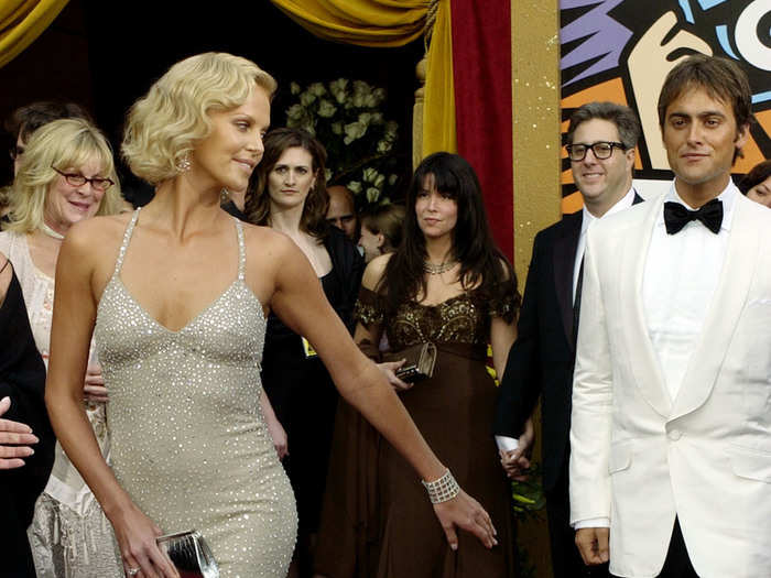 Charlize Theron may have gotten ugly for her award-winning performance in "Monster," but she looked gorgeous in Gucci at the Oscars in 2005.