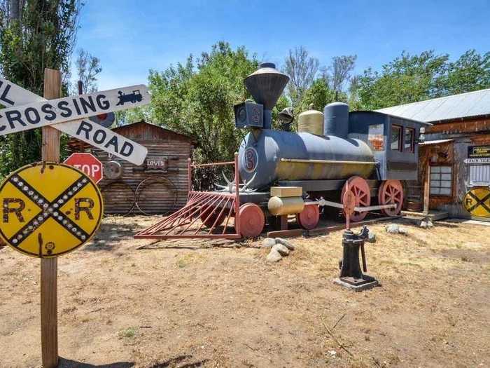 A nearly full-size replica train also sits on the property.