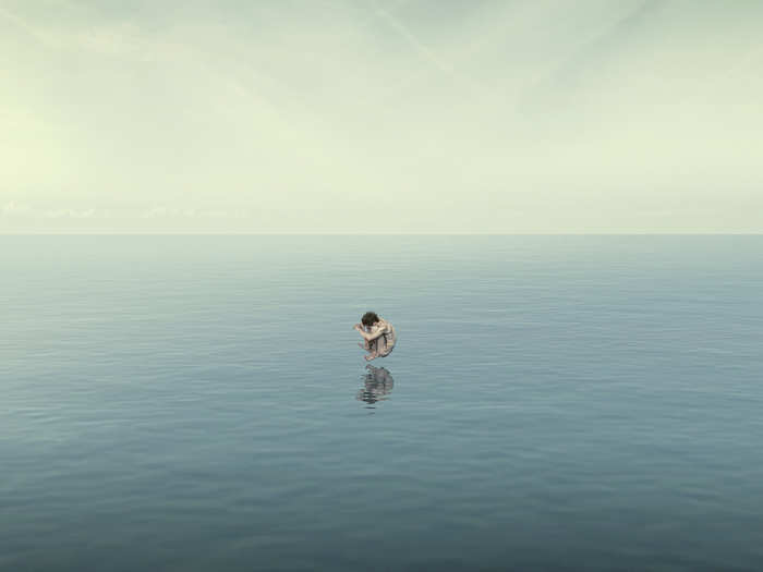 A man performs a "bomb" dive into the ocean. Photographer Antony Crossfield made the image to show how one can create "fiction" in digital photography.