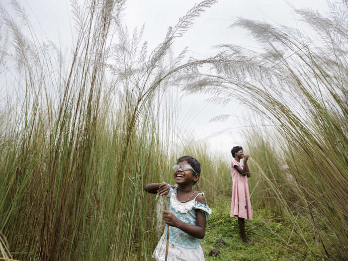 These two young girls in West Bengal, India were born into poverty with congenital cataract blindness. The surgery to cure the blindness is simple, but many of those in India with the condition cannot afford it.