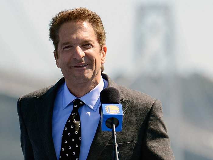 CEO and sports enthusiast Peter Guber crowds his desk with memorabilia