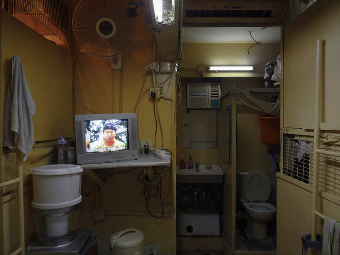 But it gets worse. To maximize income from the rent in central Hong Kong, landlords build "coffin homes," nicknamed because of their resemblance to real coffins. Twenty-four people live here, packed in a single apartment of little over 500 square feet.