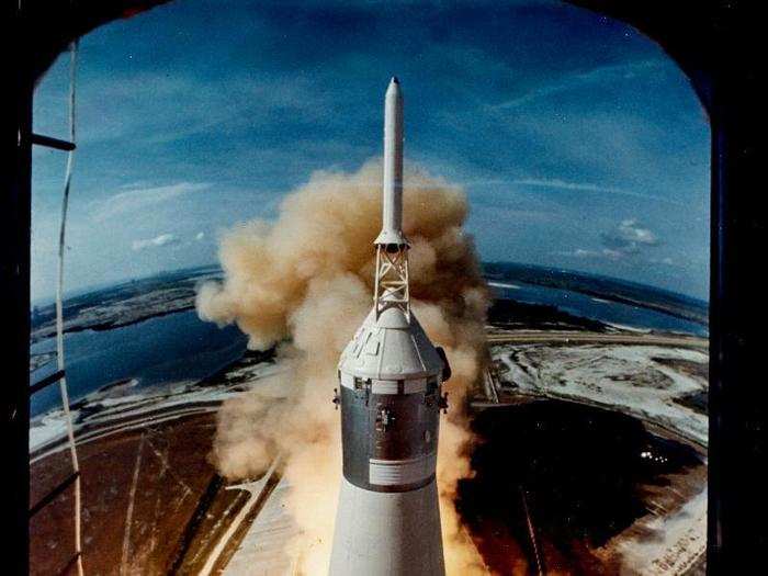 Apollo 11 lifts off on its historic flight to land men on the Moon, on July 16, 1969. "The camera was wired into the launch countdown, and at around minus-four seconds the camera started shooting something like ten frames per second," photographer Ralph Morse said.